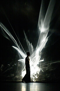 Dancer before light scene